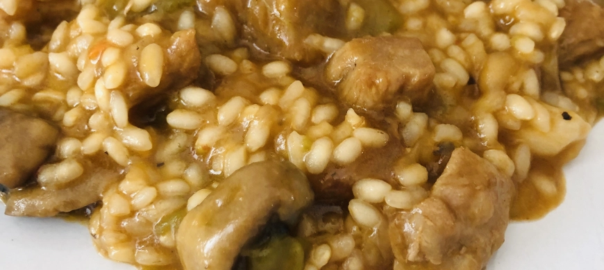 Arroz meloso de secreto ibérico al Pedro Ximenez