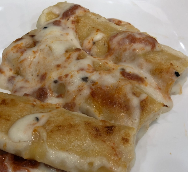 CANELONES DE PESCADO Y MARISCO CON BECHAMEL TRUFADA