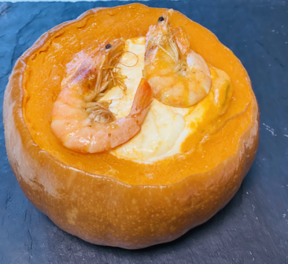Calabaza rellena de langostinos y queso